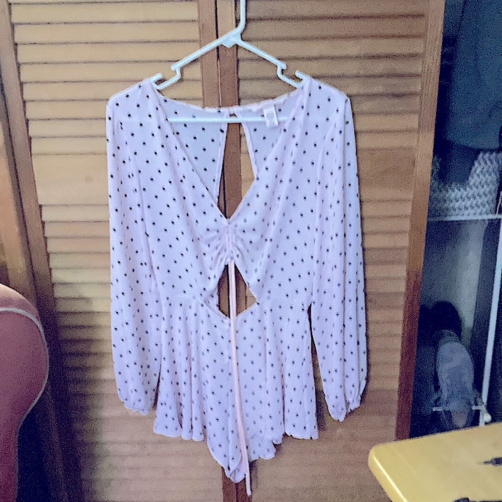 Victoria’s Secret Polka Dot Romper. Like new. Only wore once. Very comfortable.